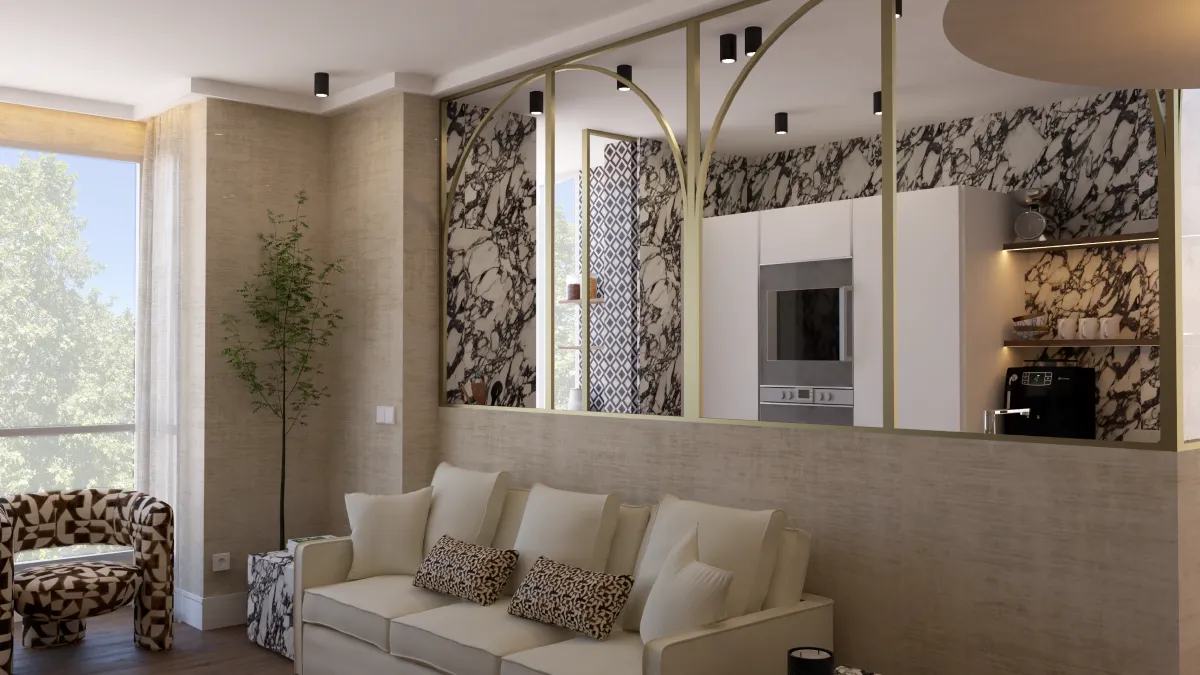 salón de BYE Interior con sofá crema, tabique acristalado de arcos dorados y cocina abierta revestida en mármol veteado negro